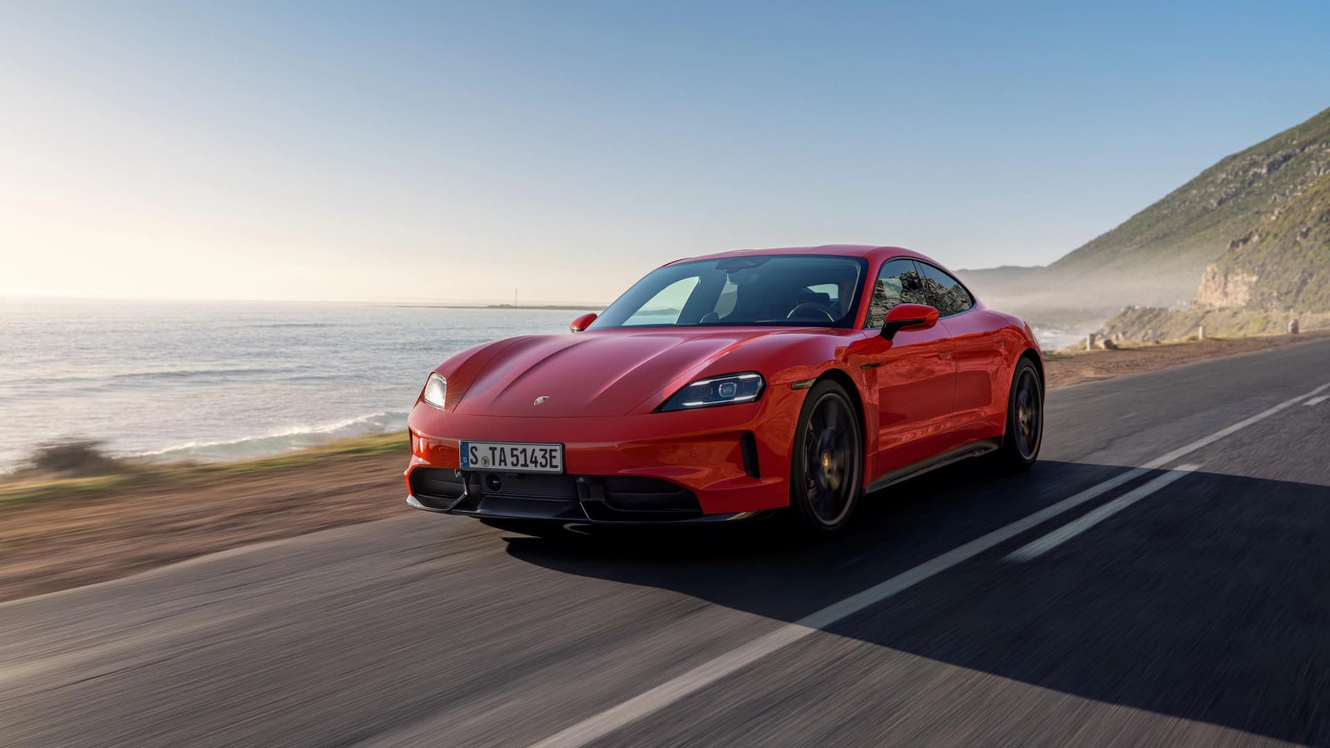 The new Porsche Taycan is a quiet experiment in making EVs feel alive again