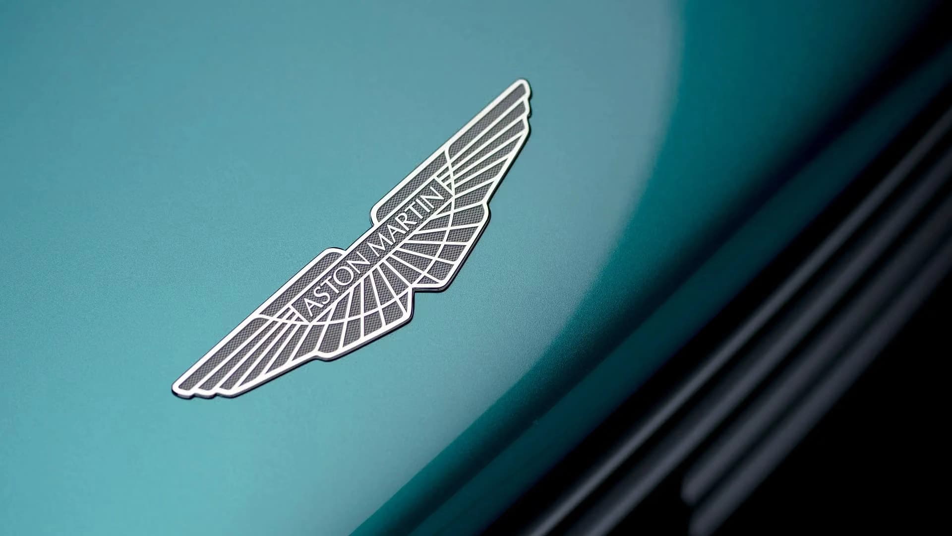 To raise cash, Aston Martin sold control of its own brand name, and its lenders are ready to sue